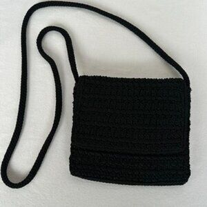 The Sak Black Hand-Crochet Crossbody Bag with Flap and Zip Closure